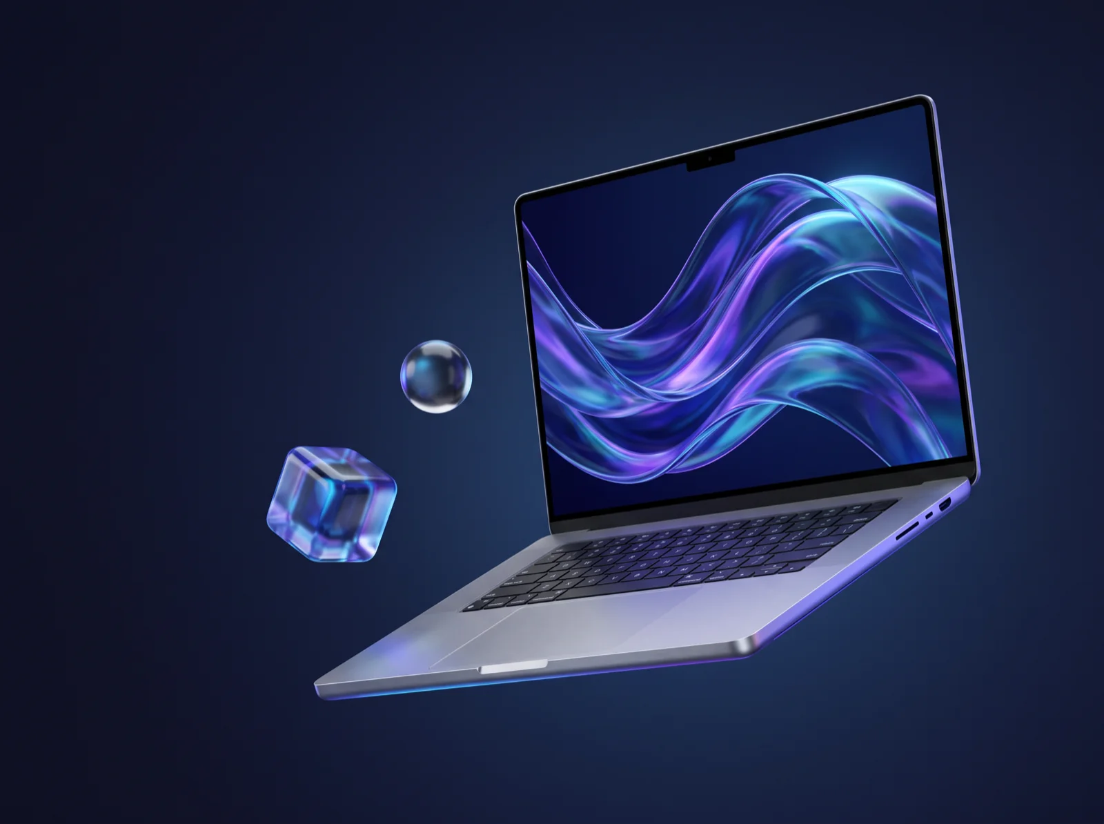 A brushed aluminum laptop whose screen shows waves of blue and violet iridescent glass, surrounded by glass shapes